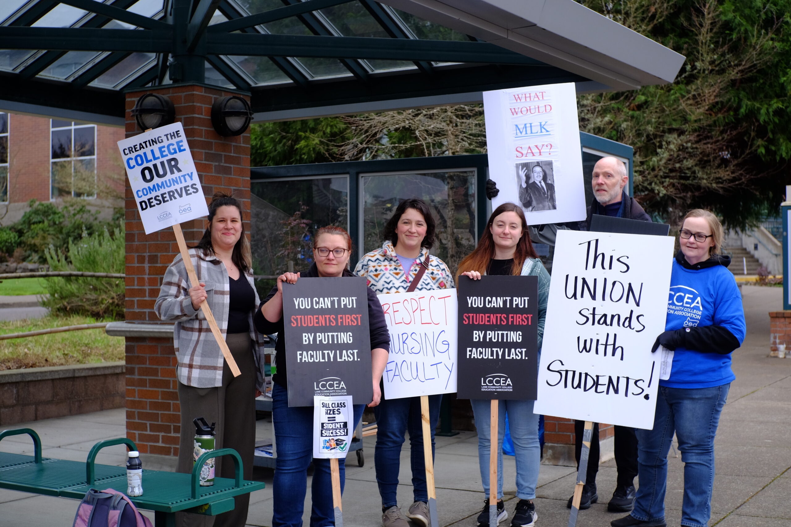 Group of student nurses holding signs in support of LCCEA at Tuesday's demonstration.